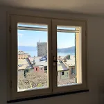 Stone Within Ancient Castle Walls Surrounded By A Lush Garden With Stunning Sea Village And Palmaria Views Sunlit Day Villa