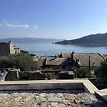 Villa Stone Within Ancient Castle Walls Surrounded By A Lush Garden With Stunning Sea Village And Palmaria Views Sunlit Day *