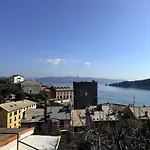 Stone Within Ancient Castle Walls Surrounded By A Lush Garden With Stunning Sea Village And Palmaria Views Sunlit Day * Porto Venere
