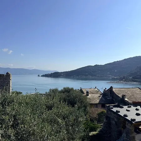 Stone Within Ancient Castle Walls Surrounded By A Lush Garden With Stunning Sea Village And Palmaria Views Sunlit Day * Porto Venere