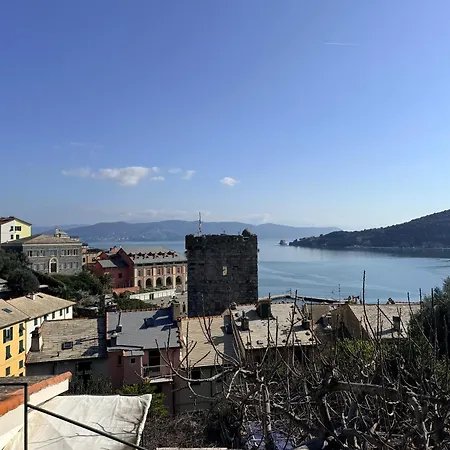 Stone Within Ancient Castle Walls Surrounded By A Lush Garden With Stunning Sea Village And Palmaria Views Sunlit Day