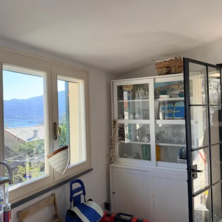 Villa Stone Within Ancient Castle Walls Surrounded By A Lush Garden With Stunning Sea Village And Palmaria Views Sunlit Day